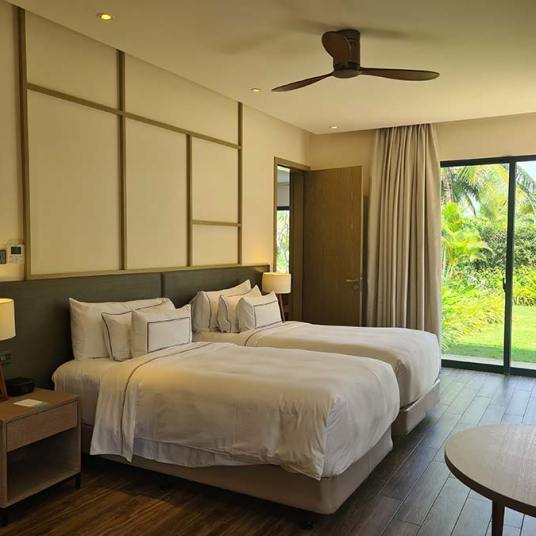 The Garden Villa water Lilly lake Melia Ho Tram Beach Resort Vietnam bedroom king size bed