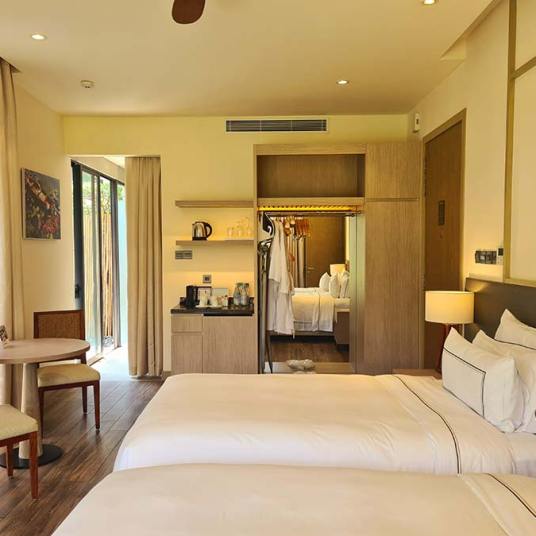 The Garden Villa water Lilly lake Melia Ho Tram Beach Resort Vietnam bedroom king size bed